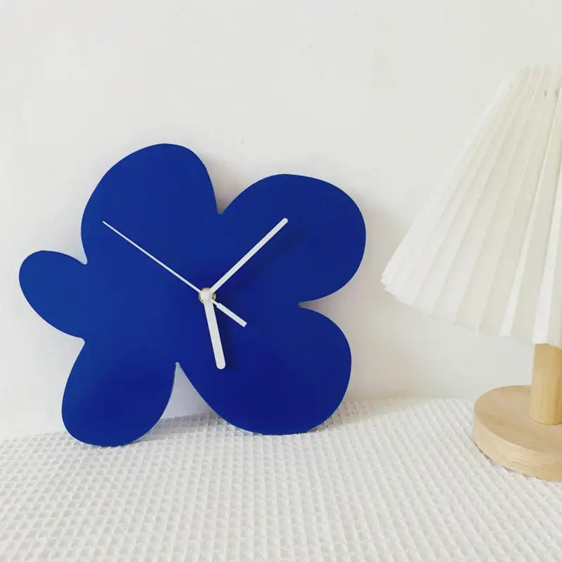 Blue flower wall clock for a playful accent