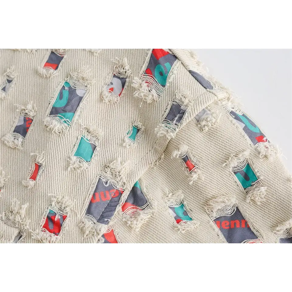 Y2k denim jacket with colorful patches for versatile style