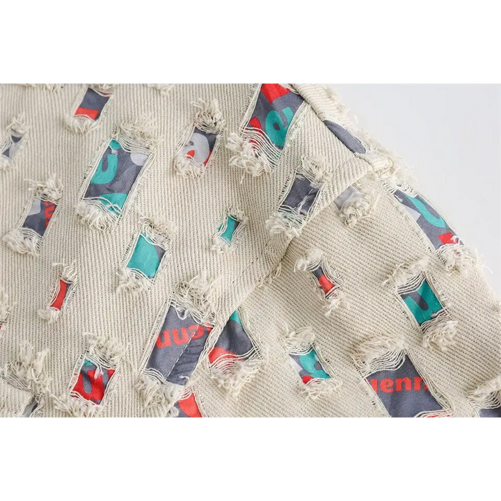 Y2k denim jacket with colorful patches for versatile style