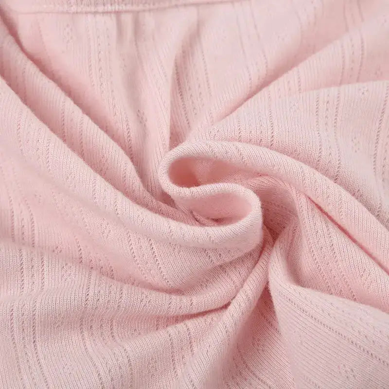 Soft pink jacket with bow straps and ruched detailing - top