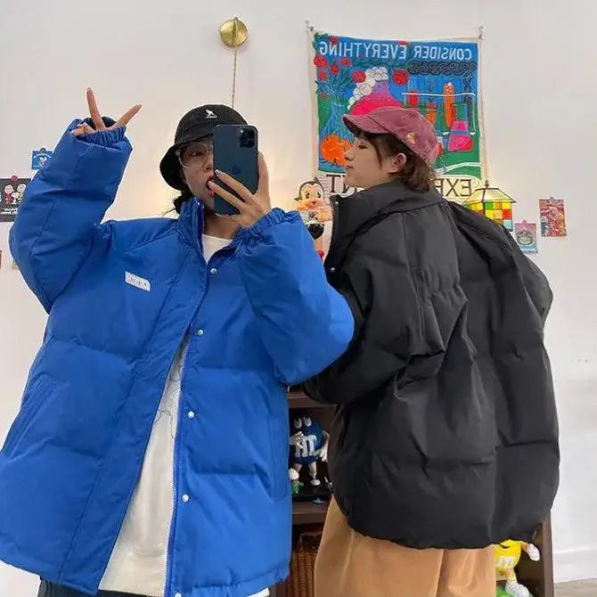 Y2k-inspired high-neck puffer with button fastening and twin pockets - jacket