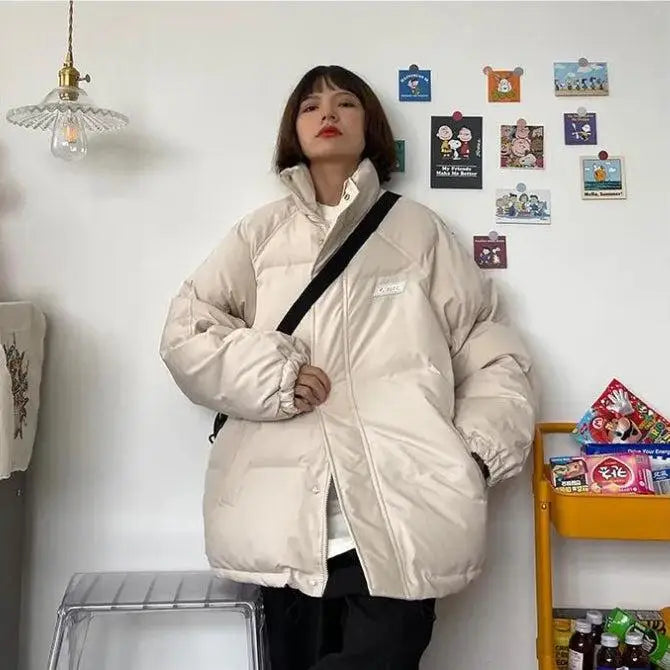 Y2k-inspired high-neck puffer with button fastening and twin pockets - jacket
