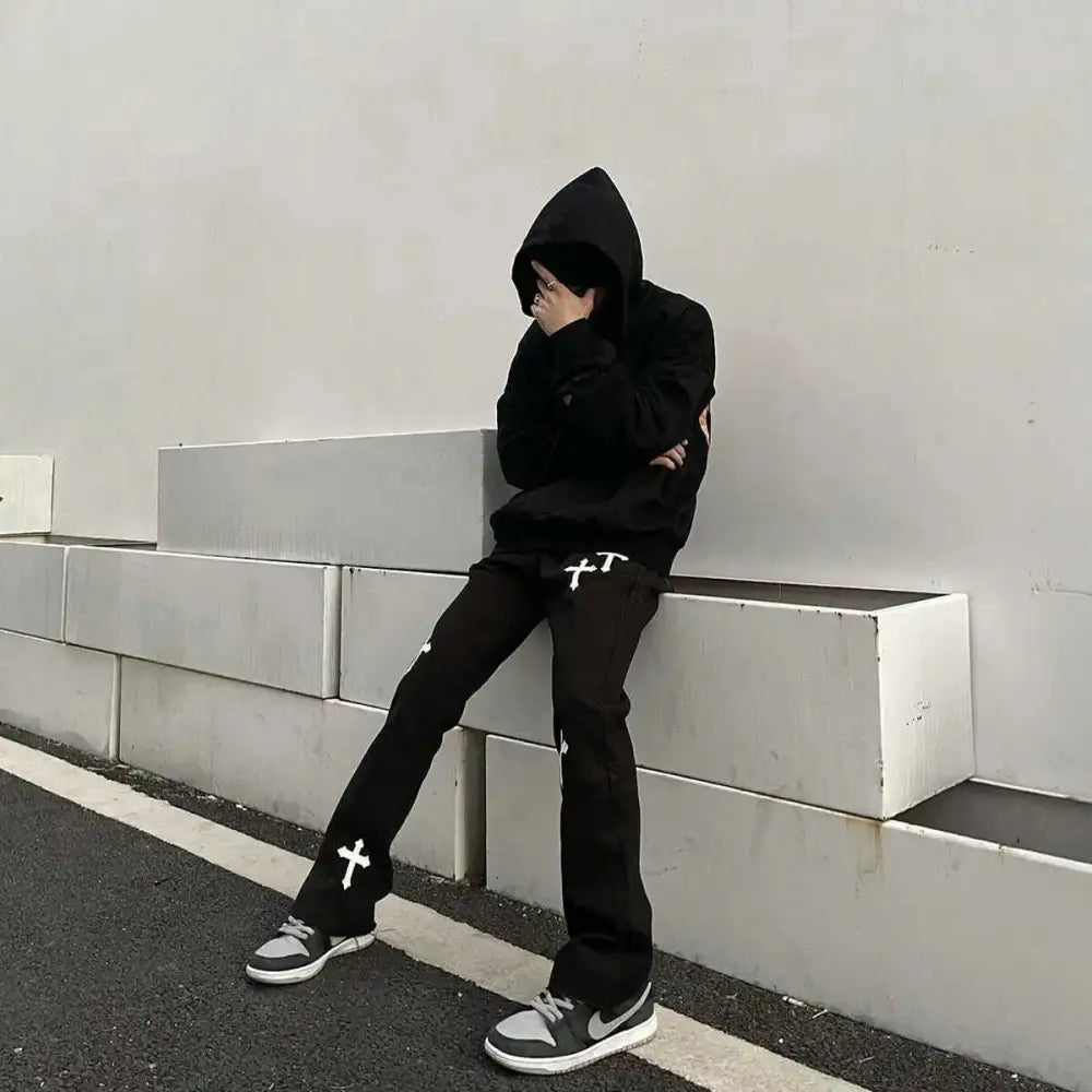 Men’s y2k jeans with a cross for unique streetwear style