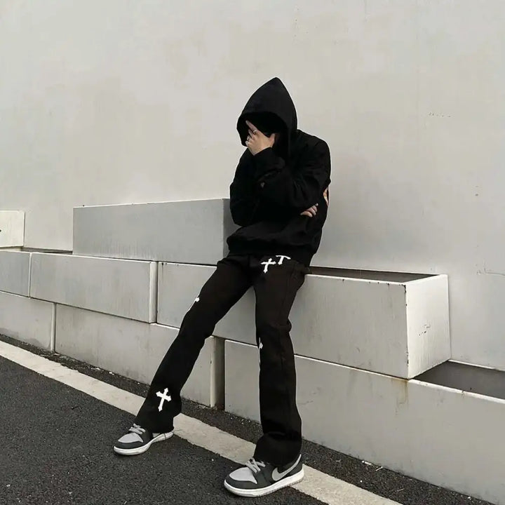 Men’s y2k jeans with a cross for unique streetwear style