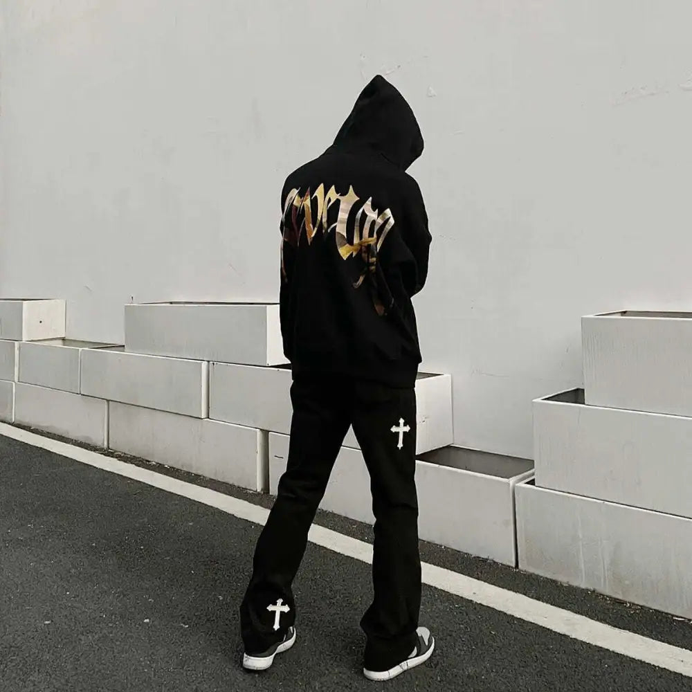 Men’s y2k jeans with a cross for unique streetwear style
