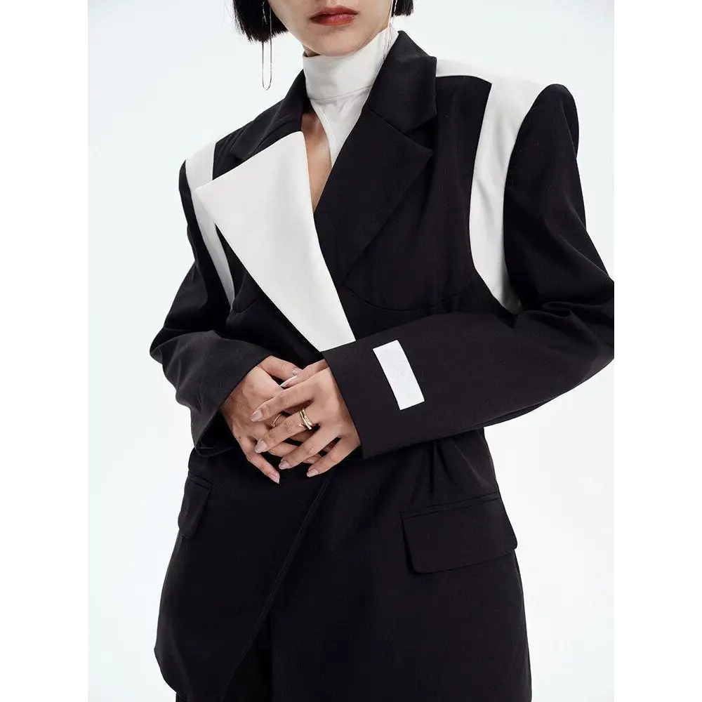 Black color block blazer with single button and halter neck design