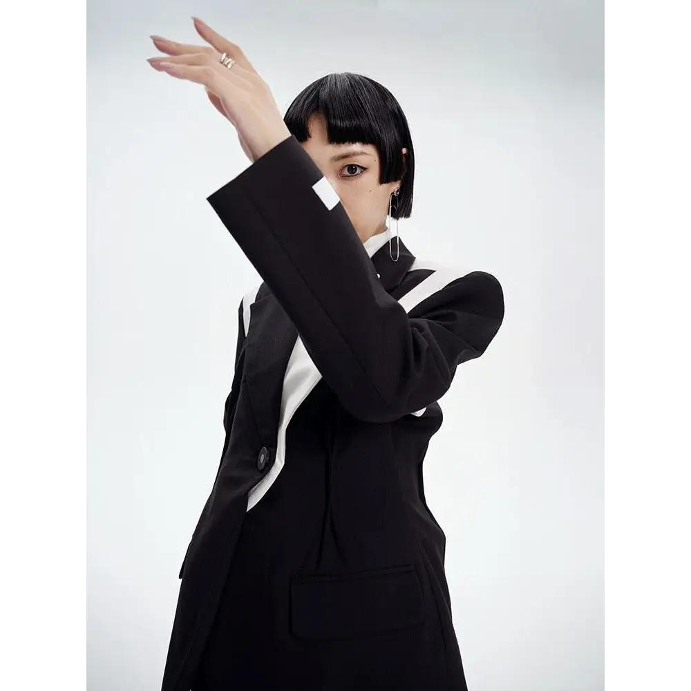 Black color block blazer with single button and halter neck design