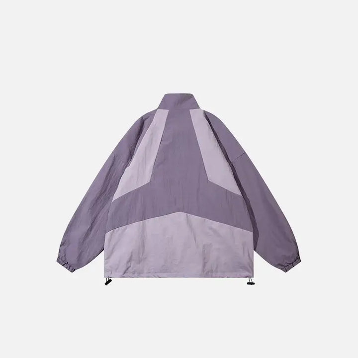 une photo d’une veste violette avec un motif blanc et black