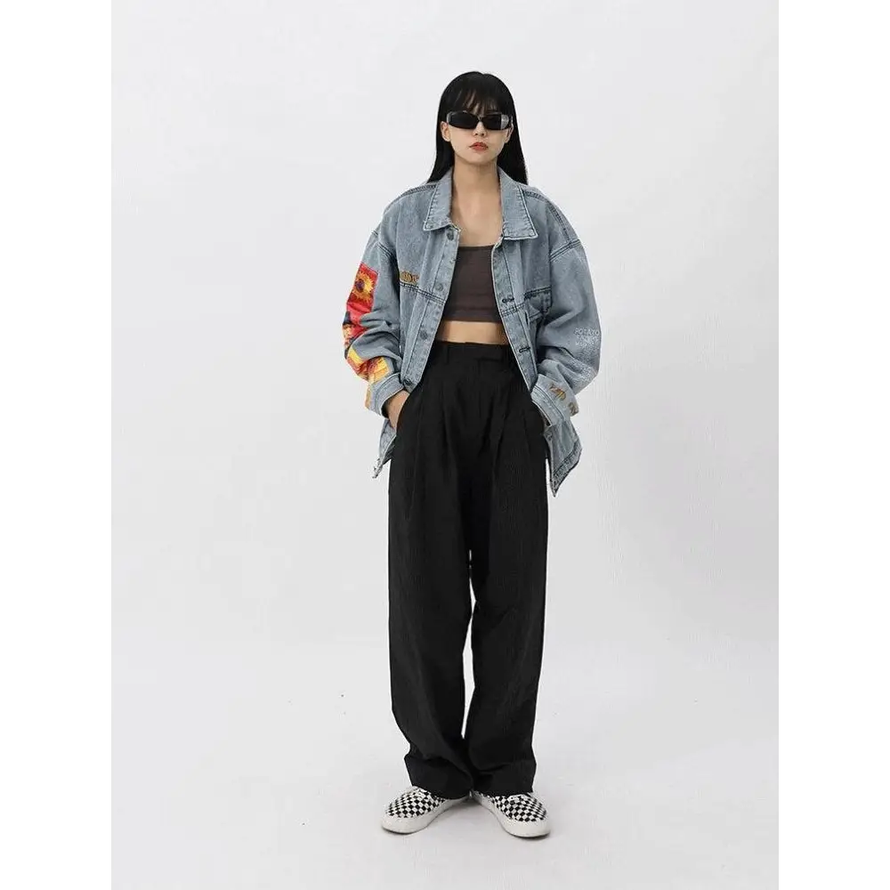 Light wash denim jacket with van gogh artistry on sleeves