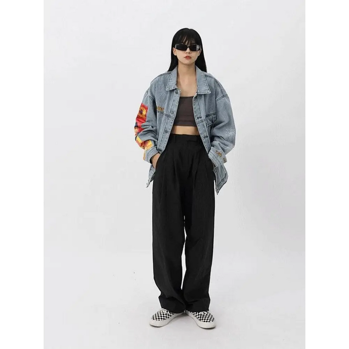 Light wash denim jacket with van gogh artistry on sleeves