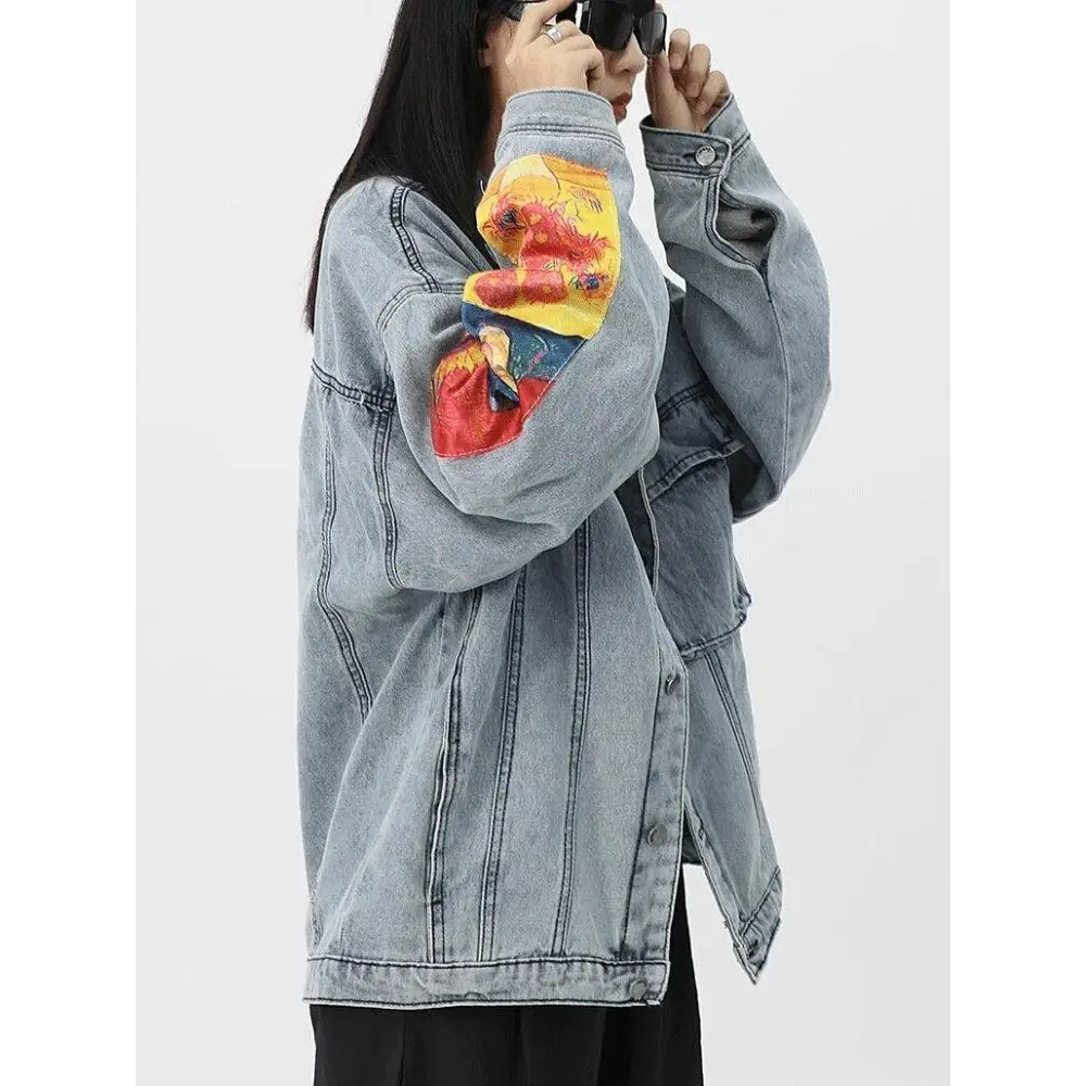 Light wash denim jacket with van gogh artistry on sleeves