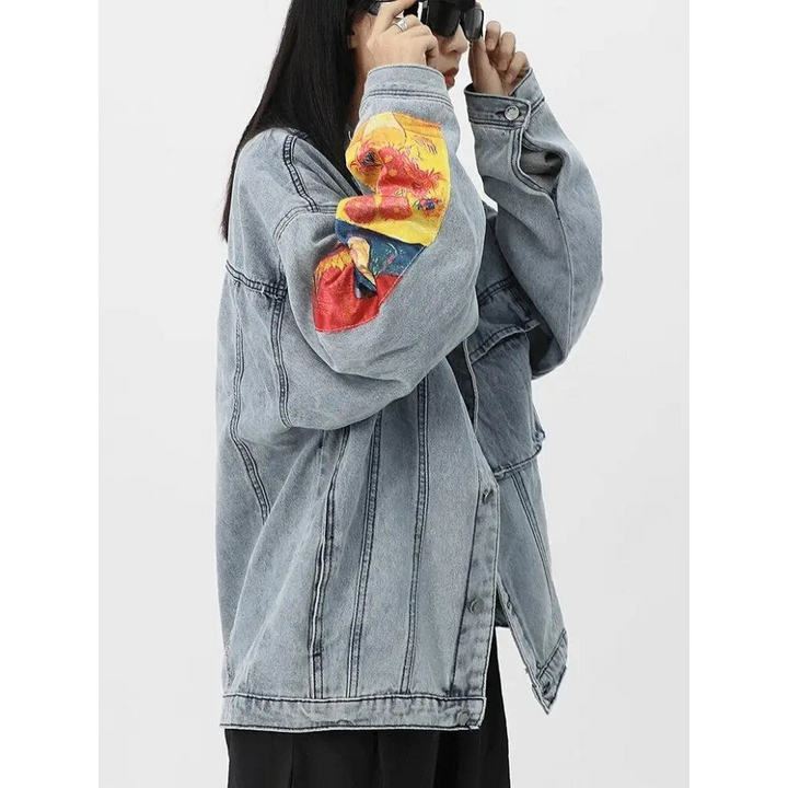 Light wash denim jacket with van gogh artistry on sleeves