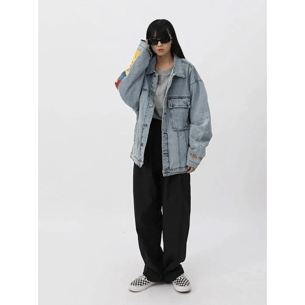 Light wash denim jacket with van gogh artistry on sleeves