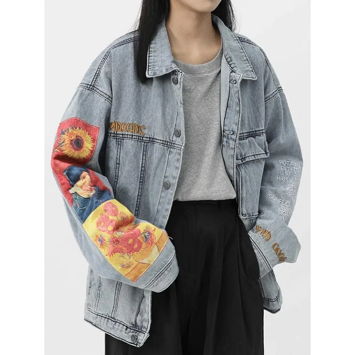 Light wash denim jacket with van gogh artistry on sleeves - blue / m