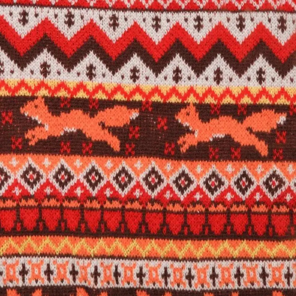 Vintage christmas sweater with embroidered fox and classic patterns