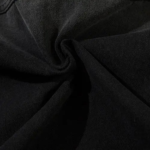 Vintage washed black denim jacket in y2k streetwear style