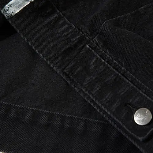 Vintage washed black denim jacket in y2k streetwear style