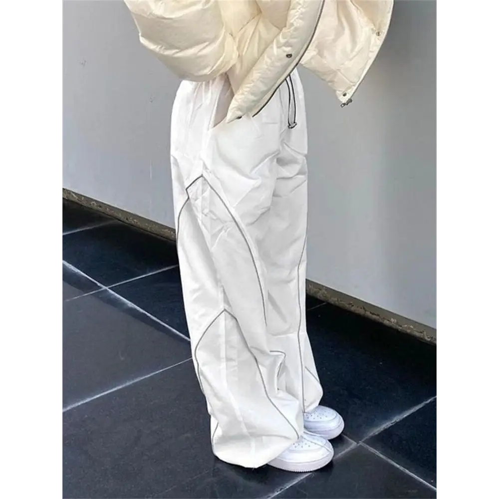 White sports y2k pants with reflective stripes