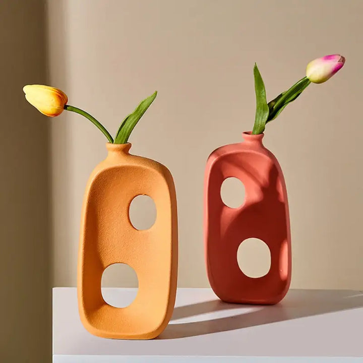 Whimsical abstract ceramic hollow vase for stylish decor