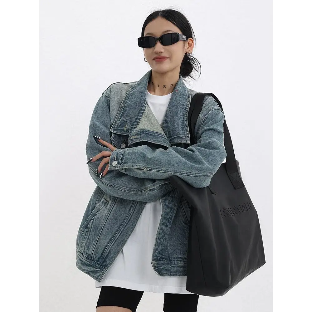 Asymmetrical denim jacket with high collar in dark wash - coat