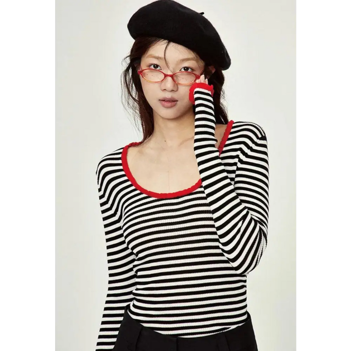 Chic black and white stripe top with scoop neckline red trim - s