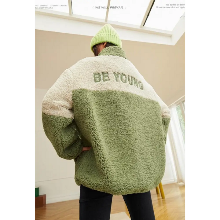 Beige and green teddy jacket with zip fastening twin hip pockets