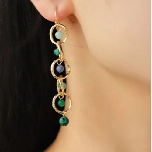 Beaded alloy dangle earrings