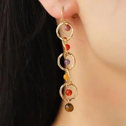 Beaded alloy dangle earrings