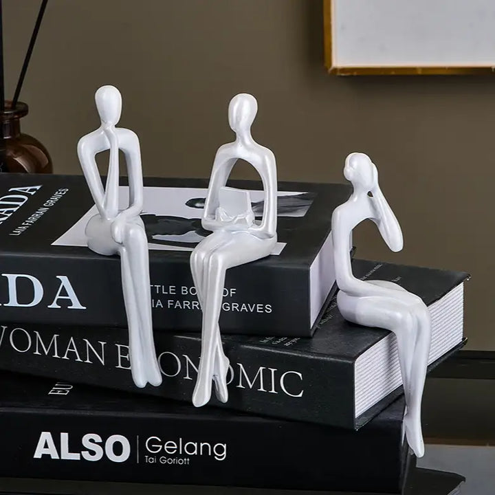 Book reading statues for aesthetic room decor in gold white and black