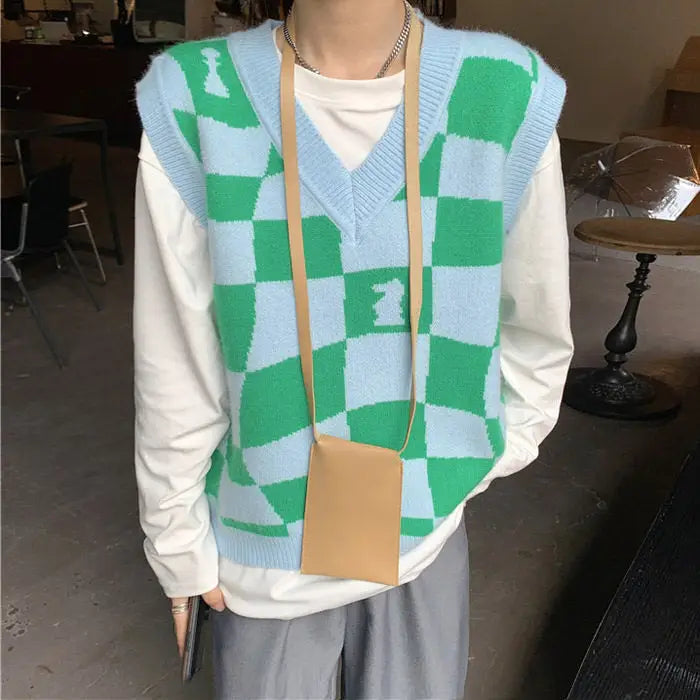 Chess board vest with checkered pattern and ribbed knit trim