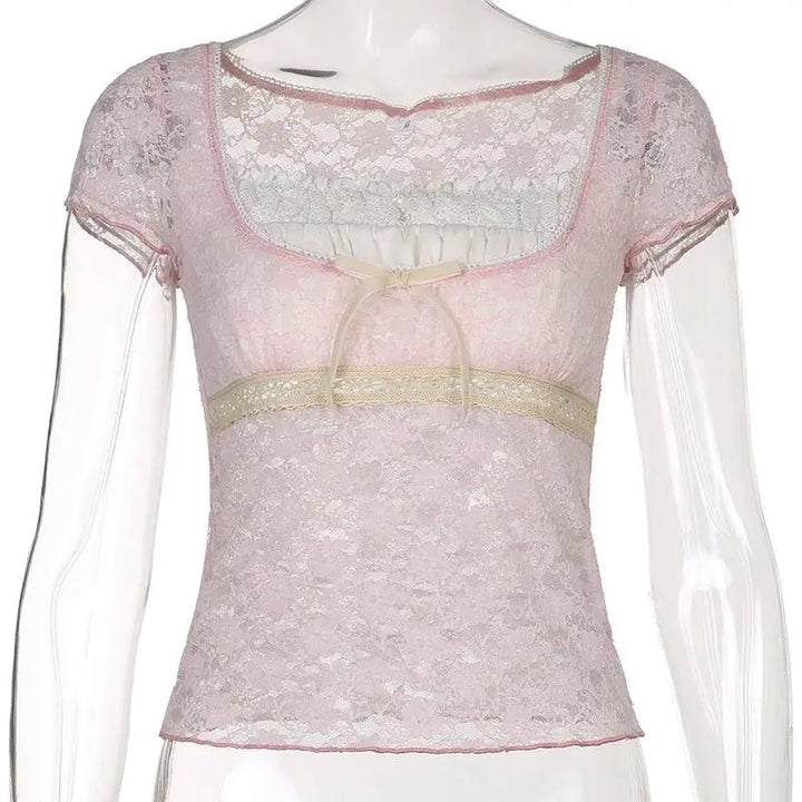 Coquette pink lace top in y2k style for a feminine silhouette - crop