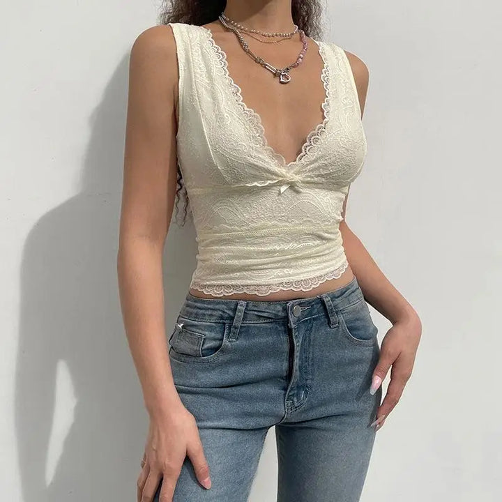 V-neck lace crop top with ribbon details for flirtatious style