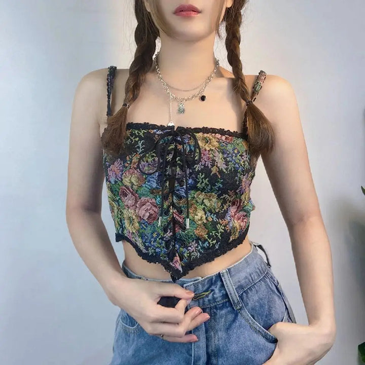 Black corset top with square neckline and lace details in cottagecore aesthetic