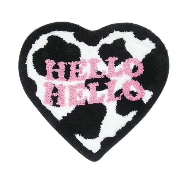 Cow print rug in heart shape for whimsical decor