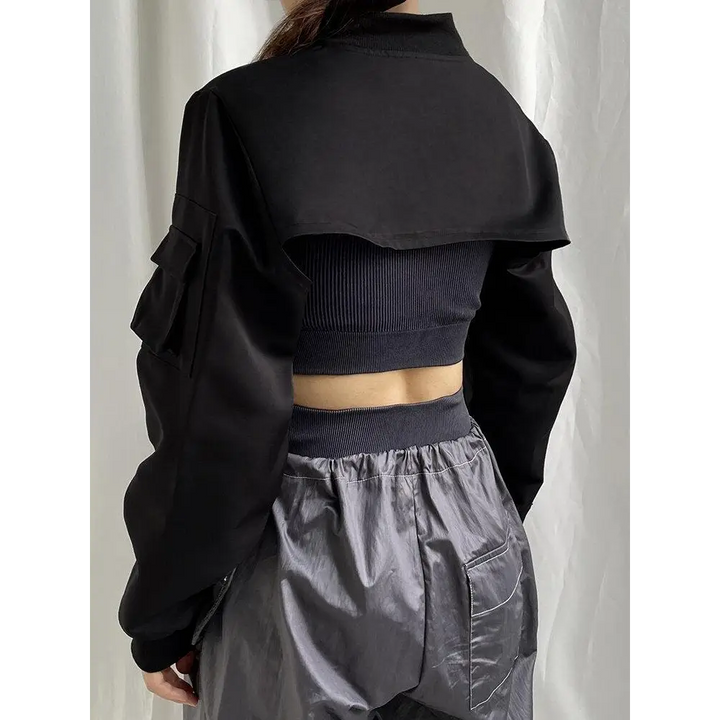 Cyberpunk aesthetic black bolero jacket with zip-up sleeve pockets