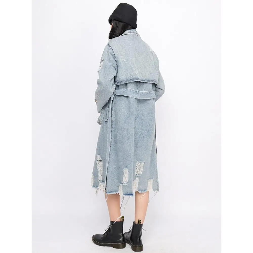 Distressed denim trench coat