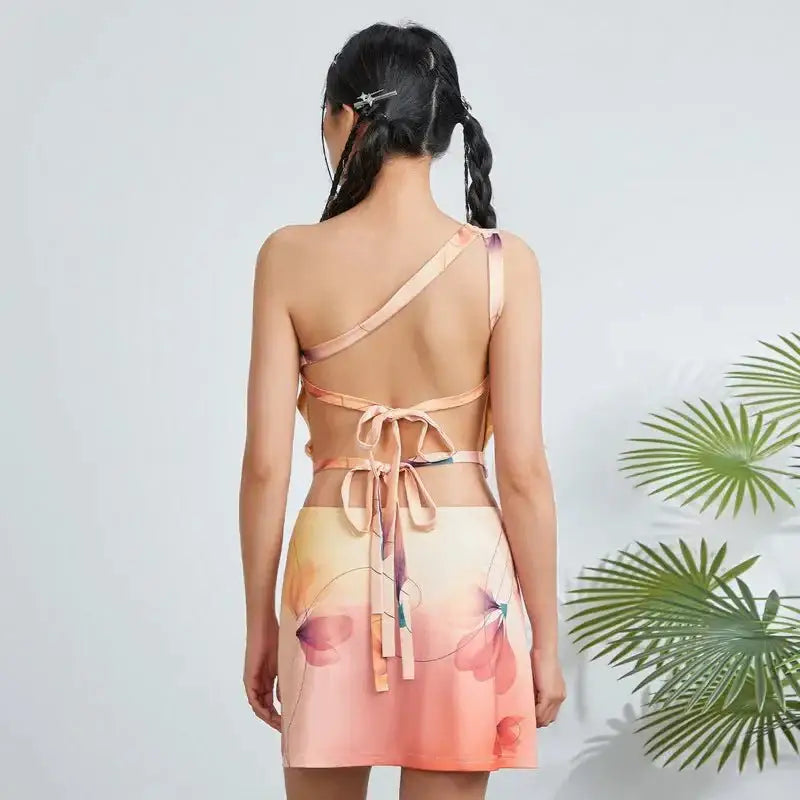 Floral print sleeveless one-shoulder top and mini a-line skirt set