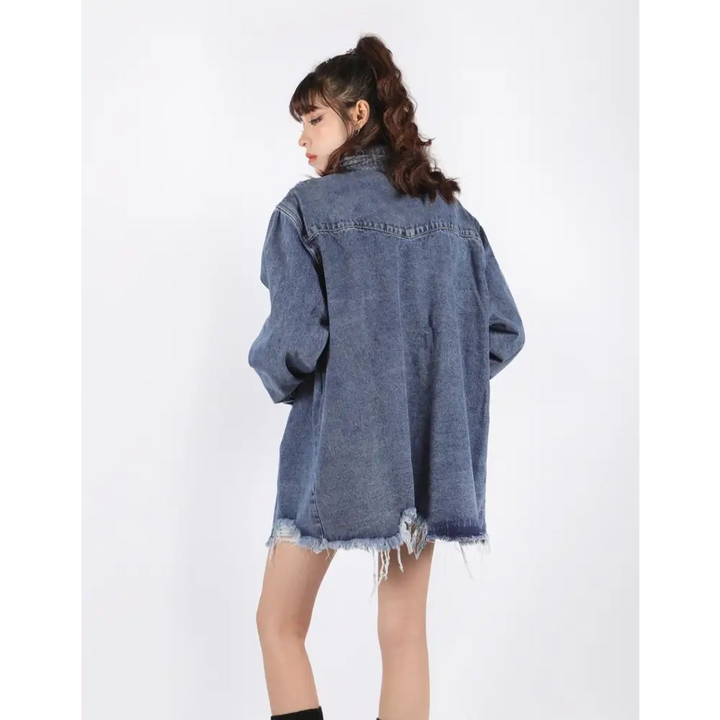 Distressed long denim jacket for a versatile grungy look