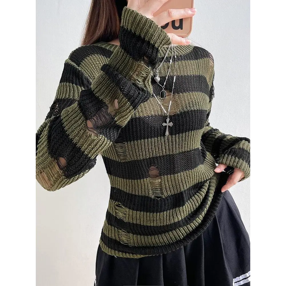 Green distressed knit sweater with black stripes for a grunge aesthetic