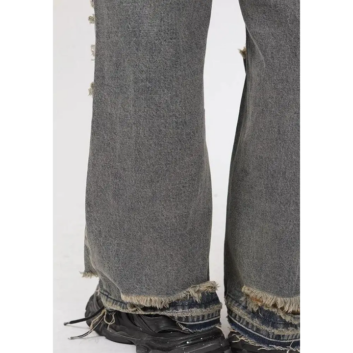 Grunge ripped straight leg jeans