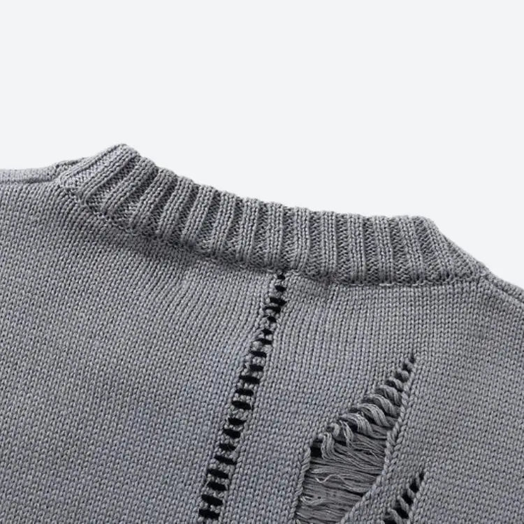 Unisex knitted sweater with spray paint and contrast sewing details