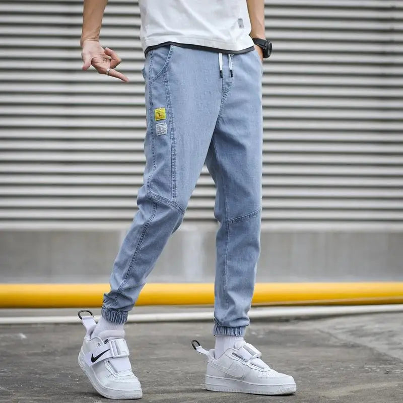 Jean jogger slim fit homme avec chevilles élastiquées