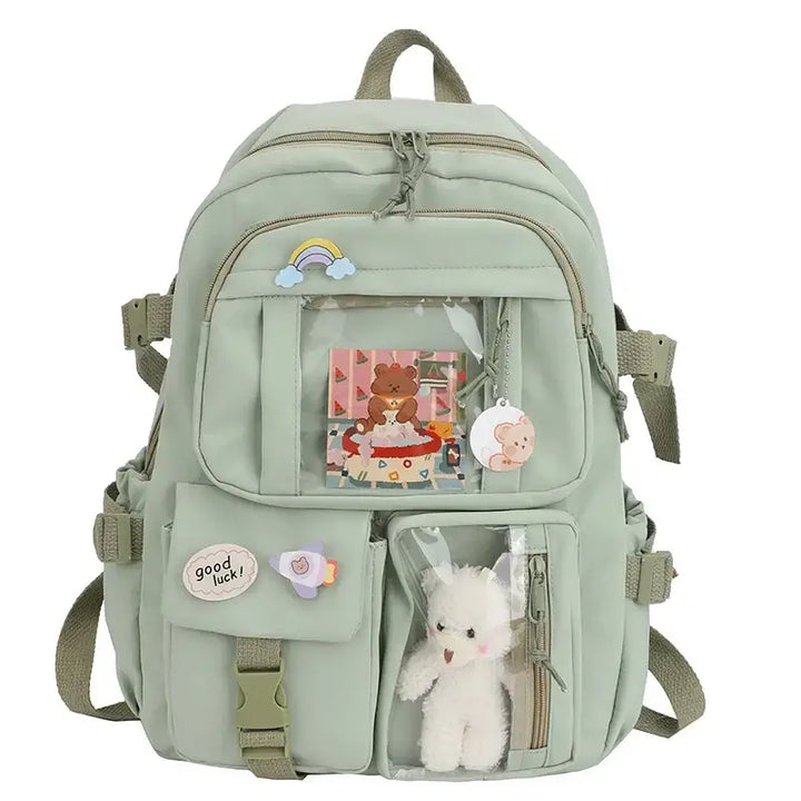 Kawaii backpack with interior slot pocket and cell phone