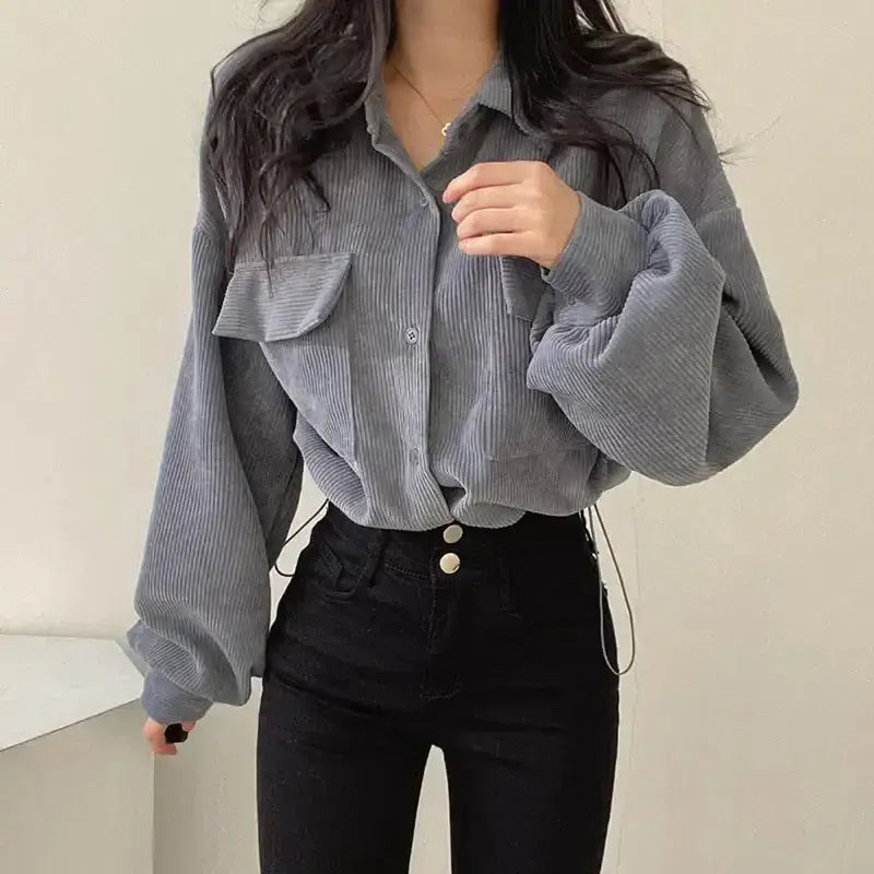 Cropped corduroy jacket with twin chest pockets in light academia style