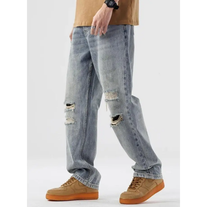 Light wash ripped jeans for y2k-inspired street style