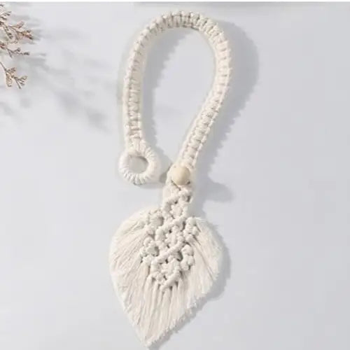 Leaf-shaped macrame curtain tieback for aesthetic room decor