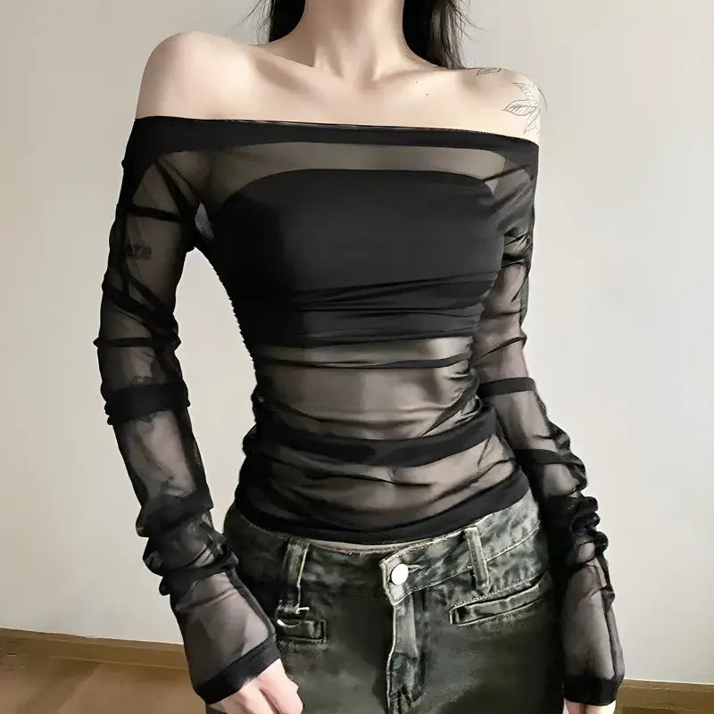 Elegant off-shoulder mesh top with transparent design and lined bust - black / s