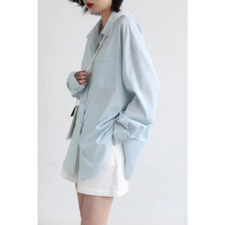 Light blue oversized poplin shirt with chest pocket in y2k style