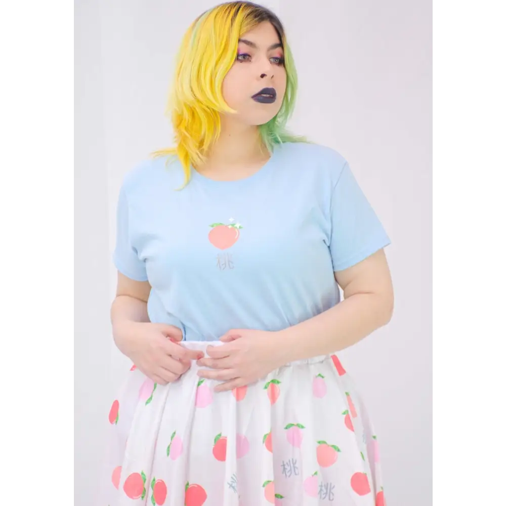 Peach graphic t-shirt for a y2k inspired look - tshirts