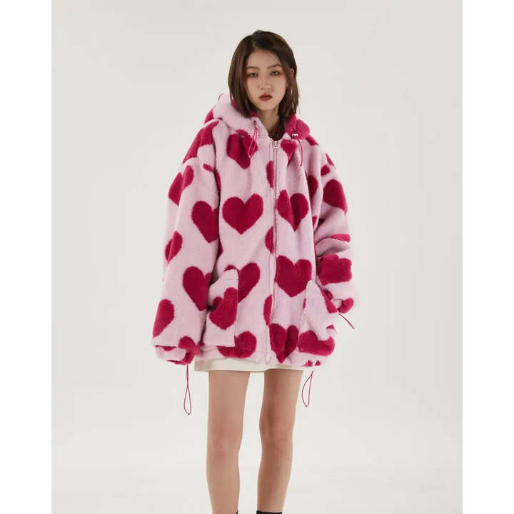 Pink hooded jacket with heart pattern and adjustable drawstring hood